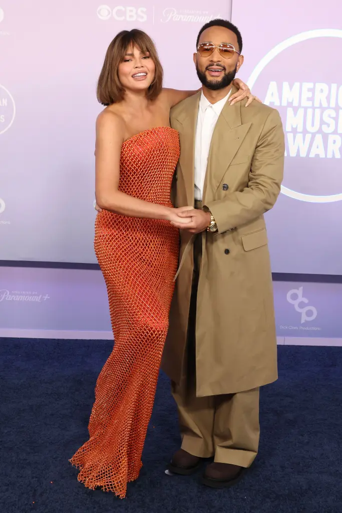 AMA 2026 Best Dressed — Every Red Carpet Look That Won the Night Chrissy Teigen orange dress AMAs