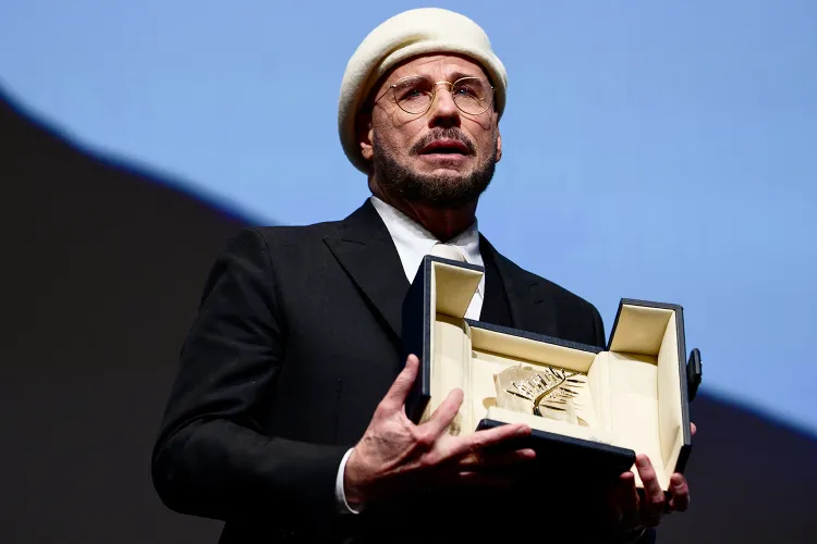 John Travolta Cannes 2026 Beret Look — The Viral Fashion Moment With the Most Heartwarming Story Behind It John Travolta Honorary Palme d Or
