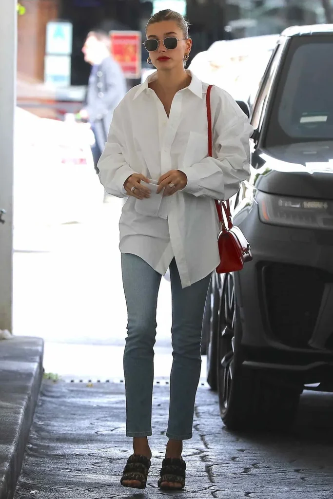 How to Build a Celebrity Capsule Wardrobe 2026 — 10 Pieces Every It-Girl Owns Hailey Bieber white button shirt capsule