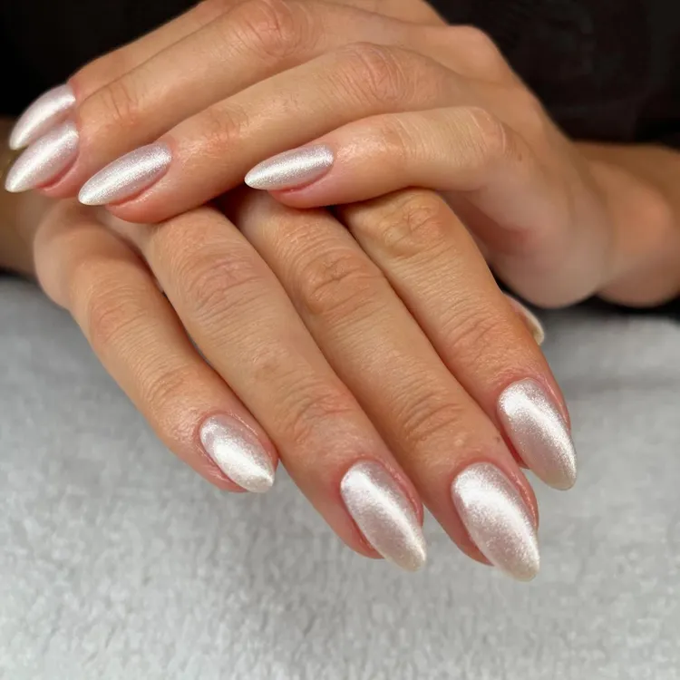 Celebrity Summer Nail Trends 2026 — Glazed Jelly, Seaglass and Every Look to Try Iridescent Sparkle chrome nails