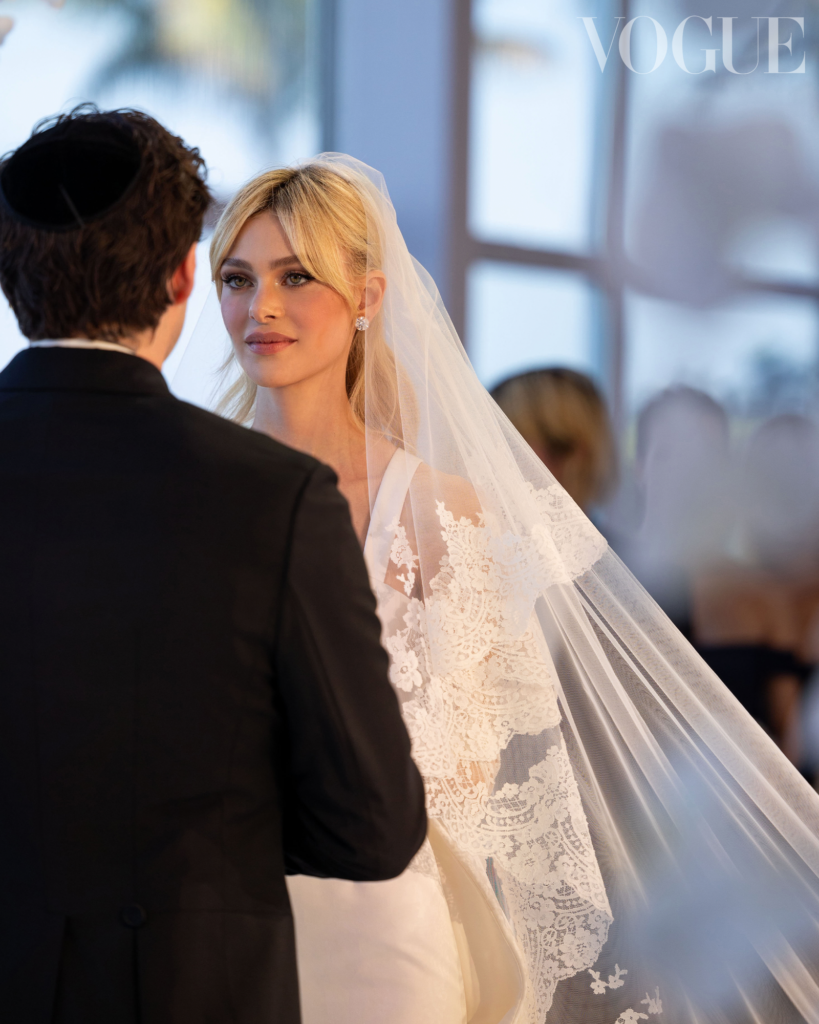 Non-Traditional Celebrity Wedding Dresses 2026 — The Suit Bride Trend Explained Nicola Peltz married Brooklyn Beckham in 2022