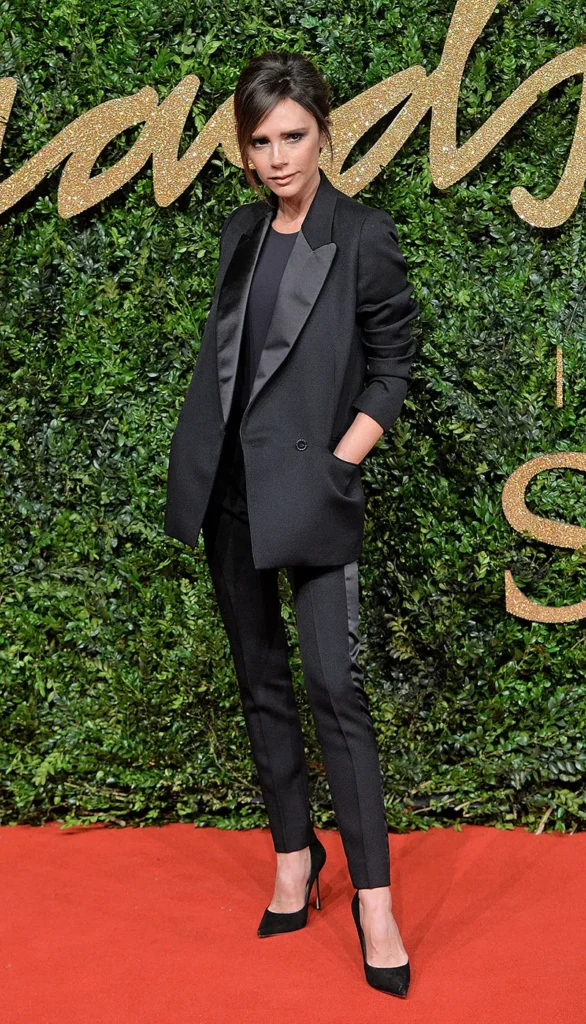 Victoria Beckham Style Evolution — From Spice Girl to Global Fashion Icon Victoria Beckham attends the British Fashion Awards 2015 at London Coliseum on Nov. 23, 2015 in London.
