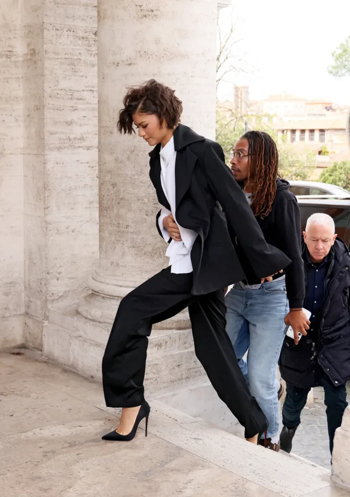 How to Build a Celebrity Capsule Wardrobe 2026 — 10 Pieces Every It-Girl Owns Zendaya's tailored trousers