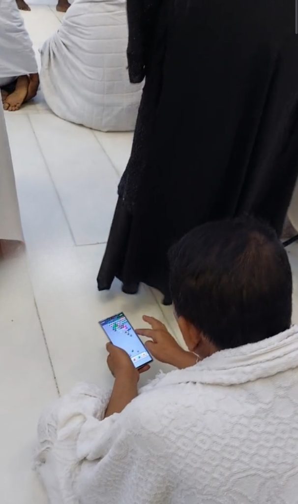 Man Playing A Game in Khana Kaaba